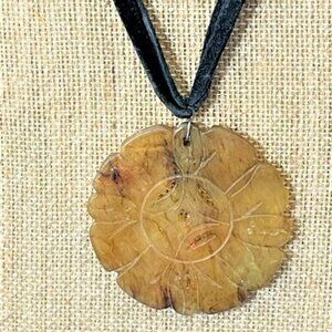 Necklace, carved natural stone pendant pendant